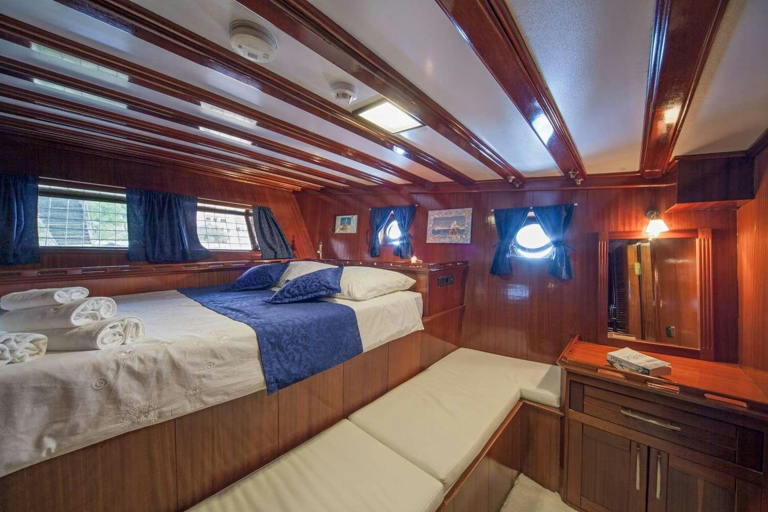 a room with two beds aboard STELLA MARIS Yacht for Charter