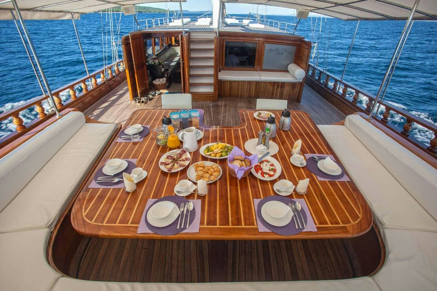 a table on a boat aboard STELLA MARIS Yacht for Charter