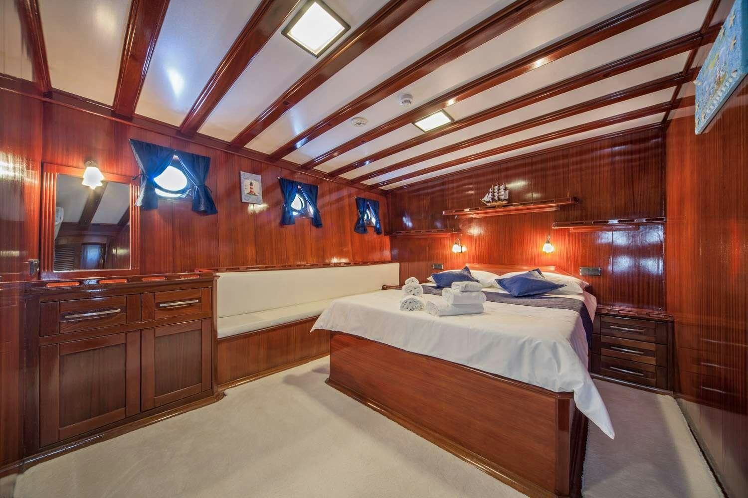a room with two beds aboard STELLA MARIS Yacht for Charter