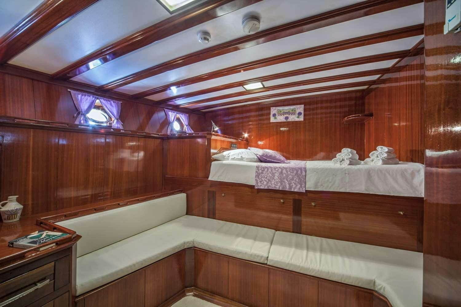 a room with two beds aboard STELLA MARIS Yacht for Charter