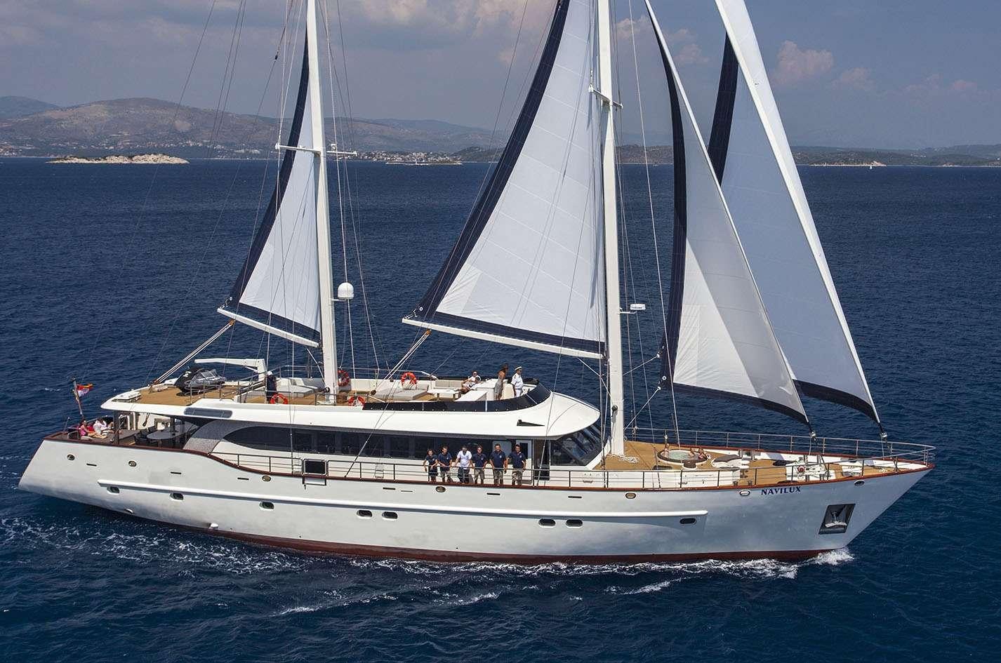 a boat with people on it aboard NAVILUX Yacht for Charter