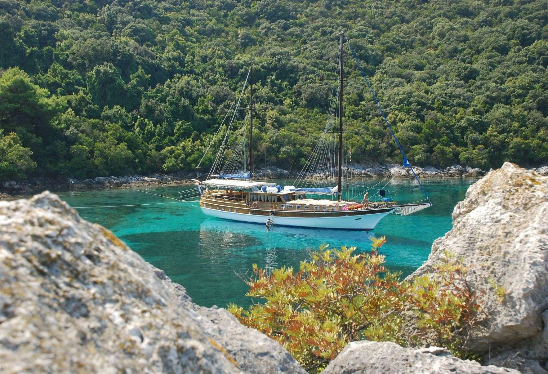 a boat in a body of water aboard LINDA Yacht for Charter