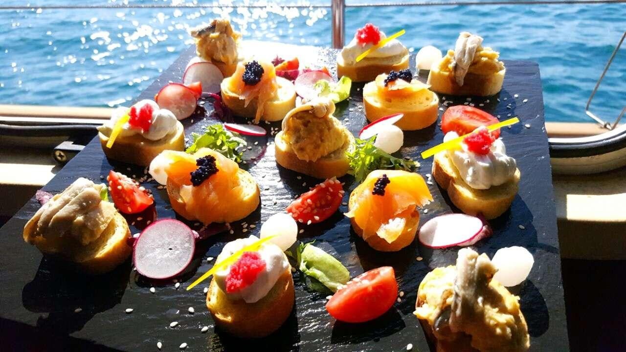 a group of colorful food on a table aboard ANGELICA Yacht for Charter