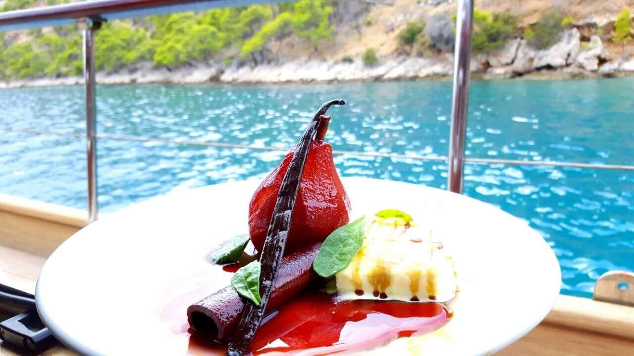 a plate of food on a boat aboard ANGELICA Yacht for Charter