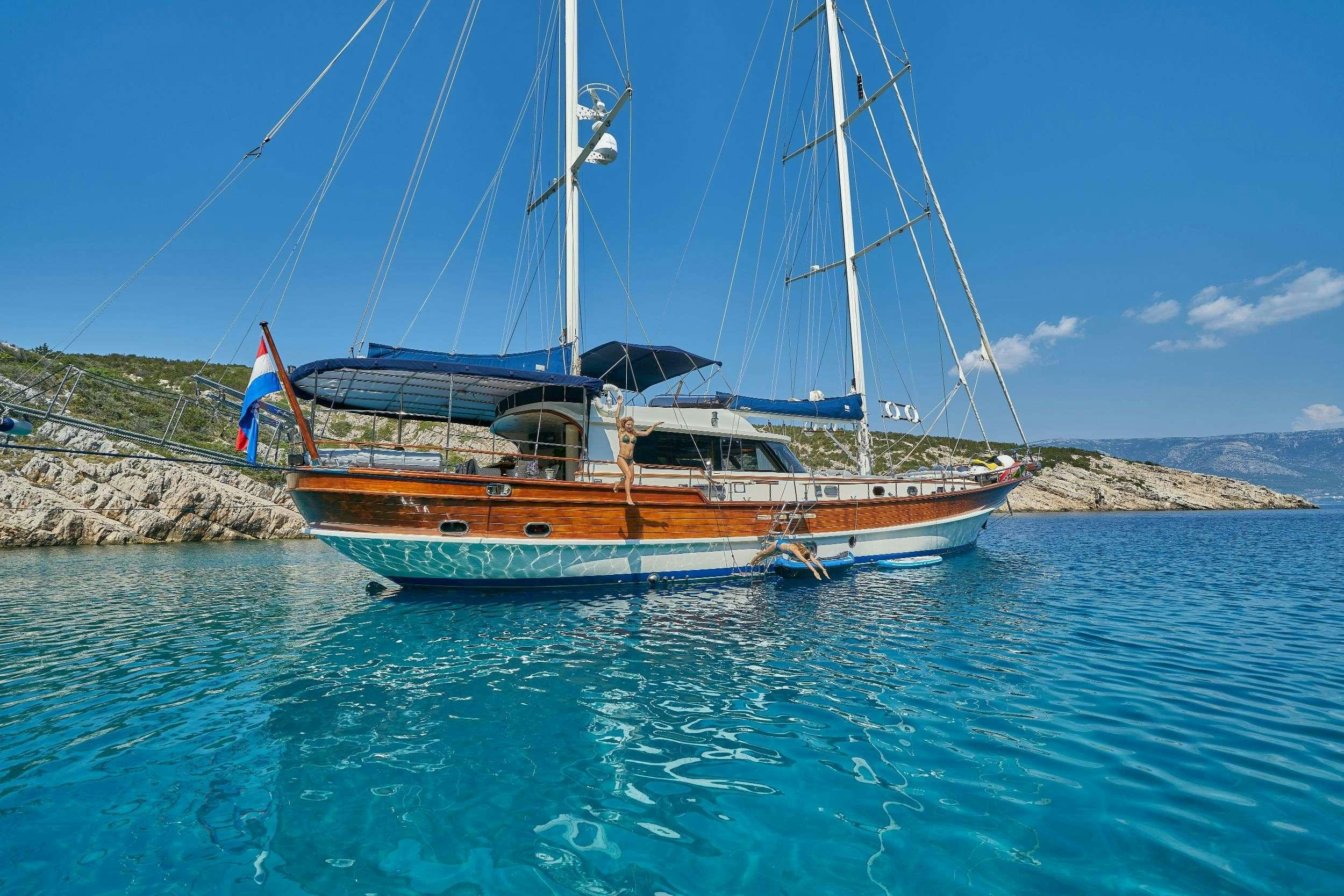 a boat in the water aboard LOTUS Yacht for Charter