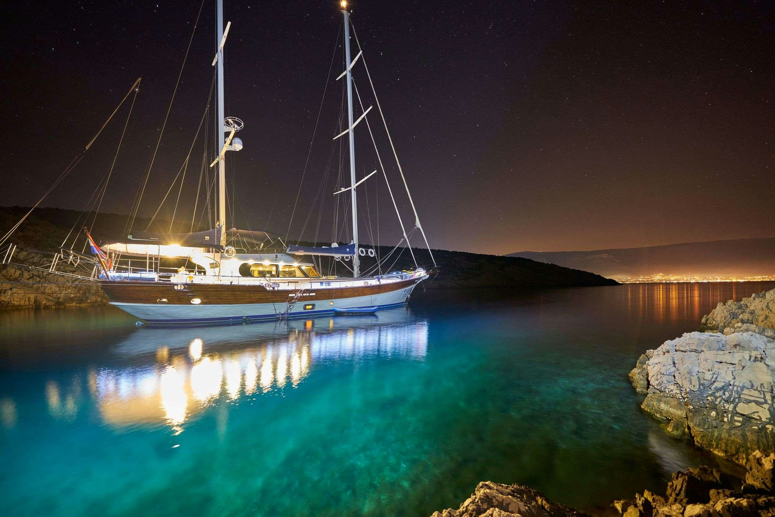 a boat in the water aboard LOTUS Yacht for Charter