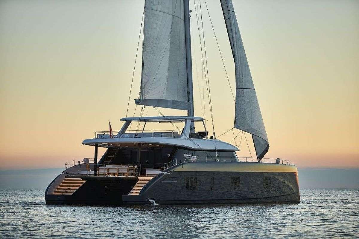 a large sailboat on the water aboard 7X Yacht for Charter