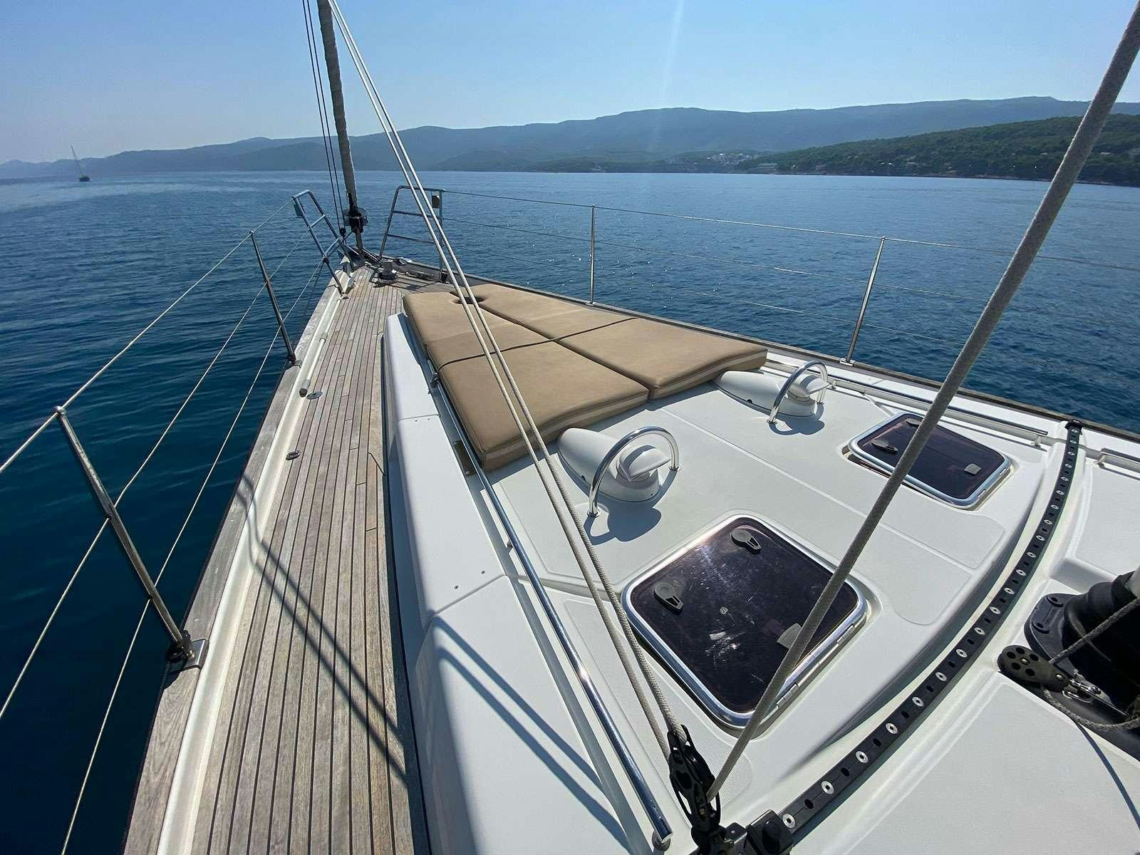 a boat on the water aboard ADIQELL (Pilot Saloon 55) Yacht for Charter