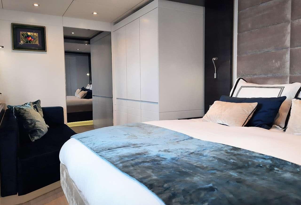 a bed in a room aboard ORION Yacht for Charter