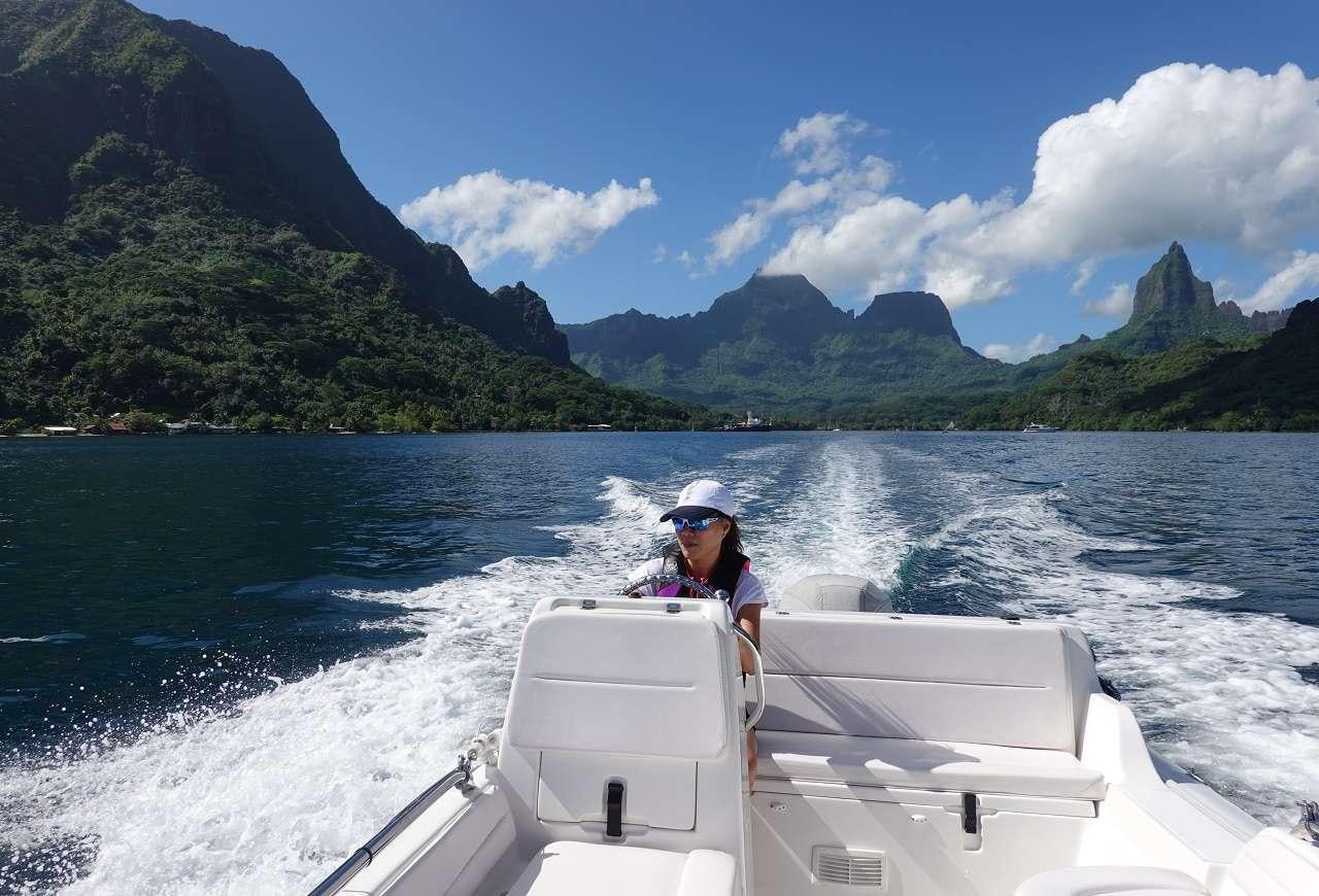 a man in a boat aboard ORION Yacht for Charter