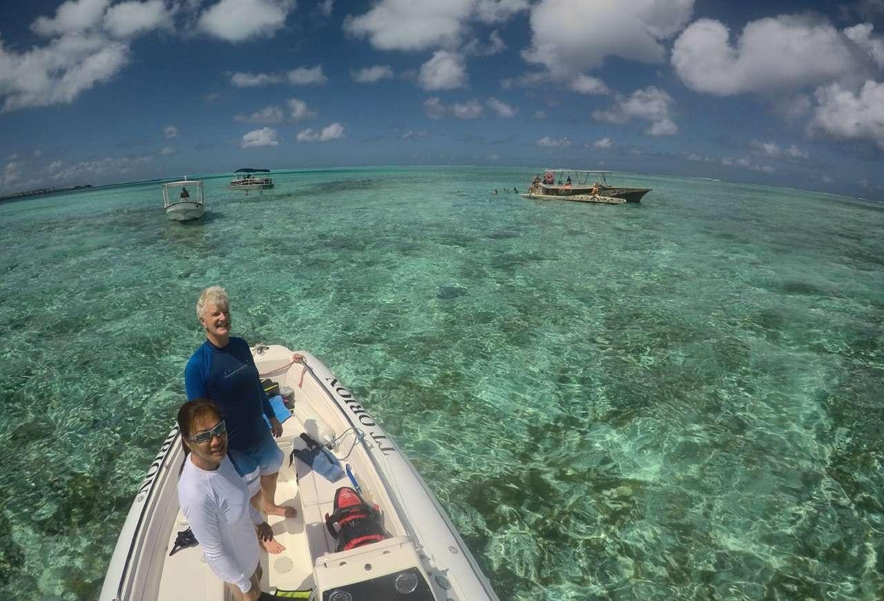 a man and woman on a boat aboard ORION Yacht for Charter