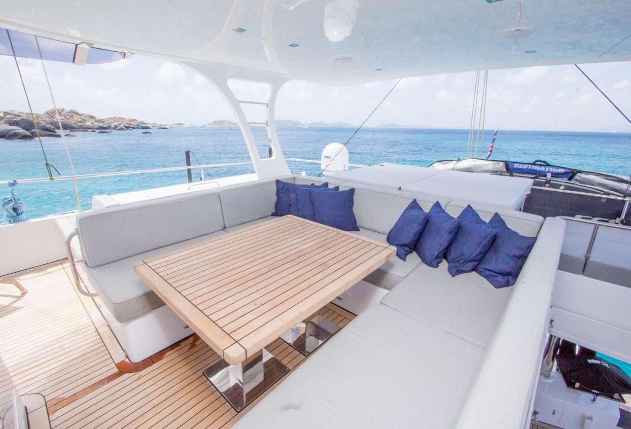 a room with a bed and a pool aboard ORION Yacht for Charter