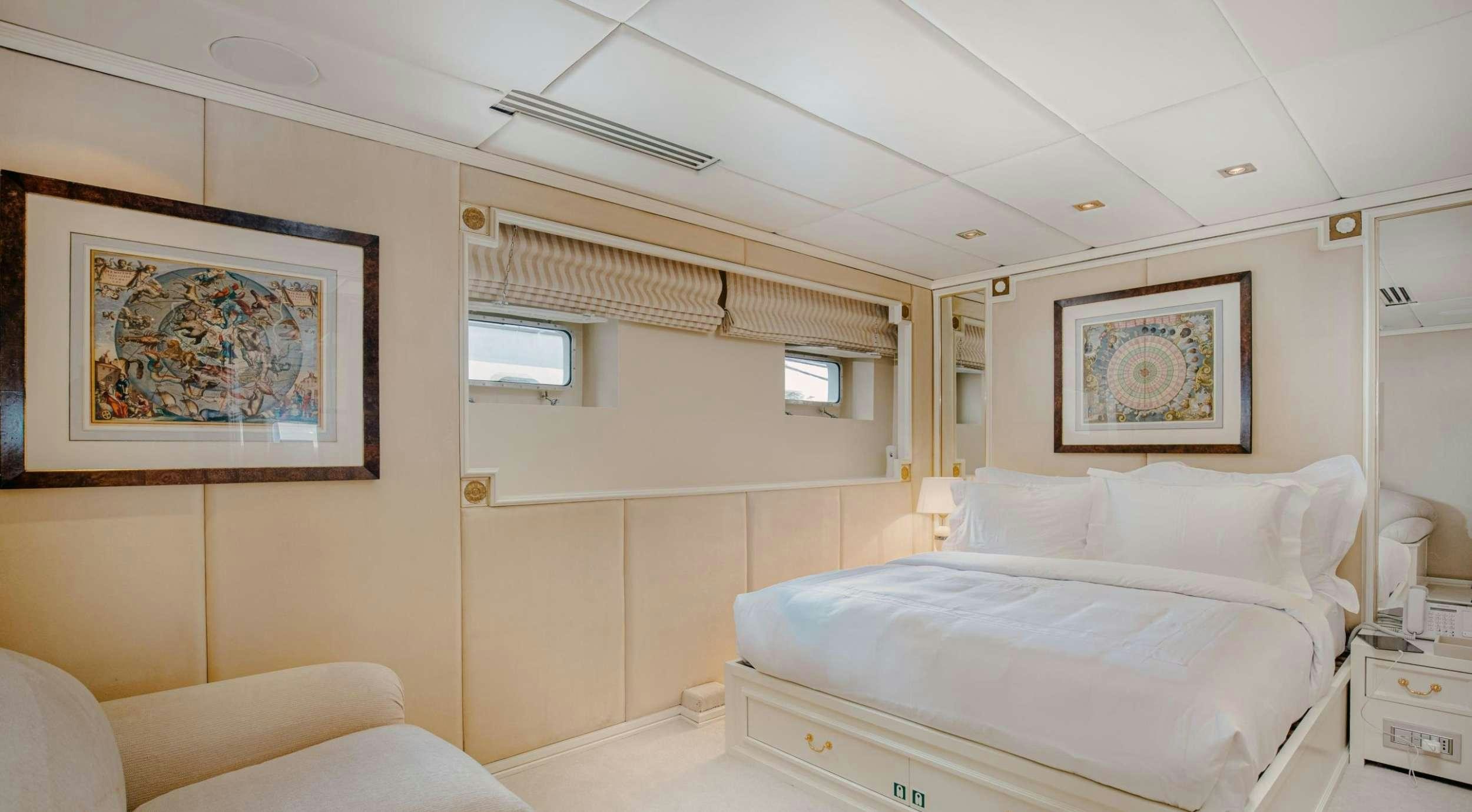 a room with two beds aboard ITOTO Yacht for Charter