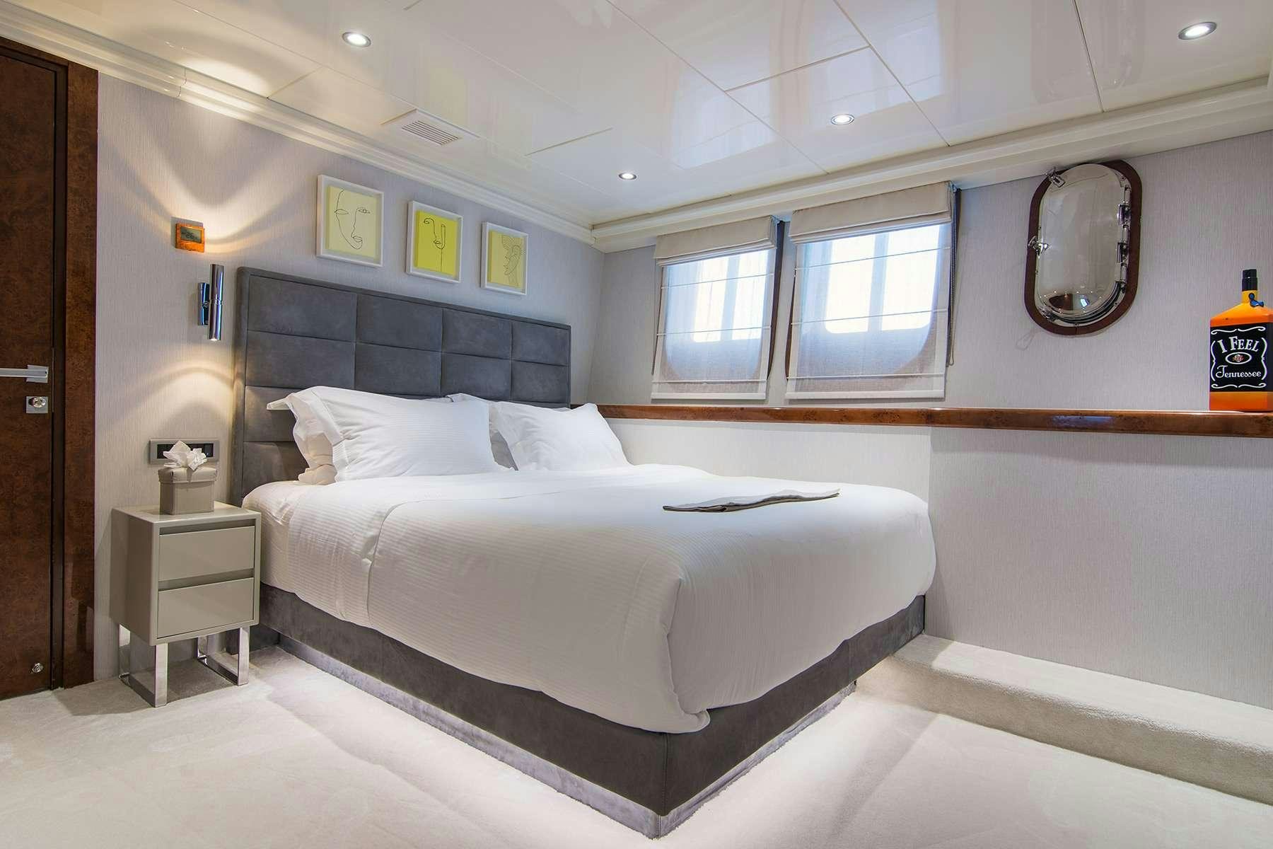 a bed in a room aboard MOKA Yacht for Charter