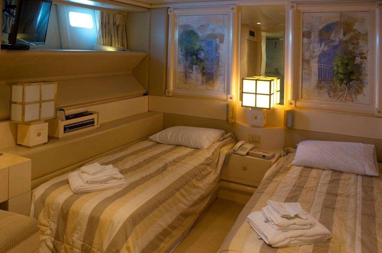 a room with two beds aboard CARMEN FONTANA Yacht for Charter