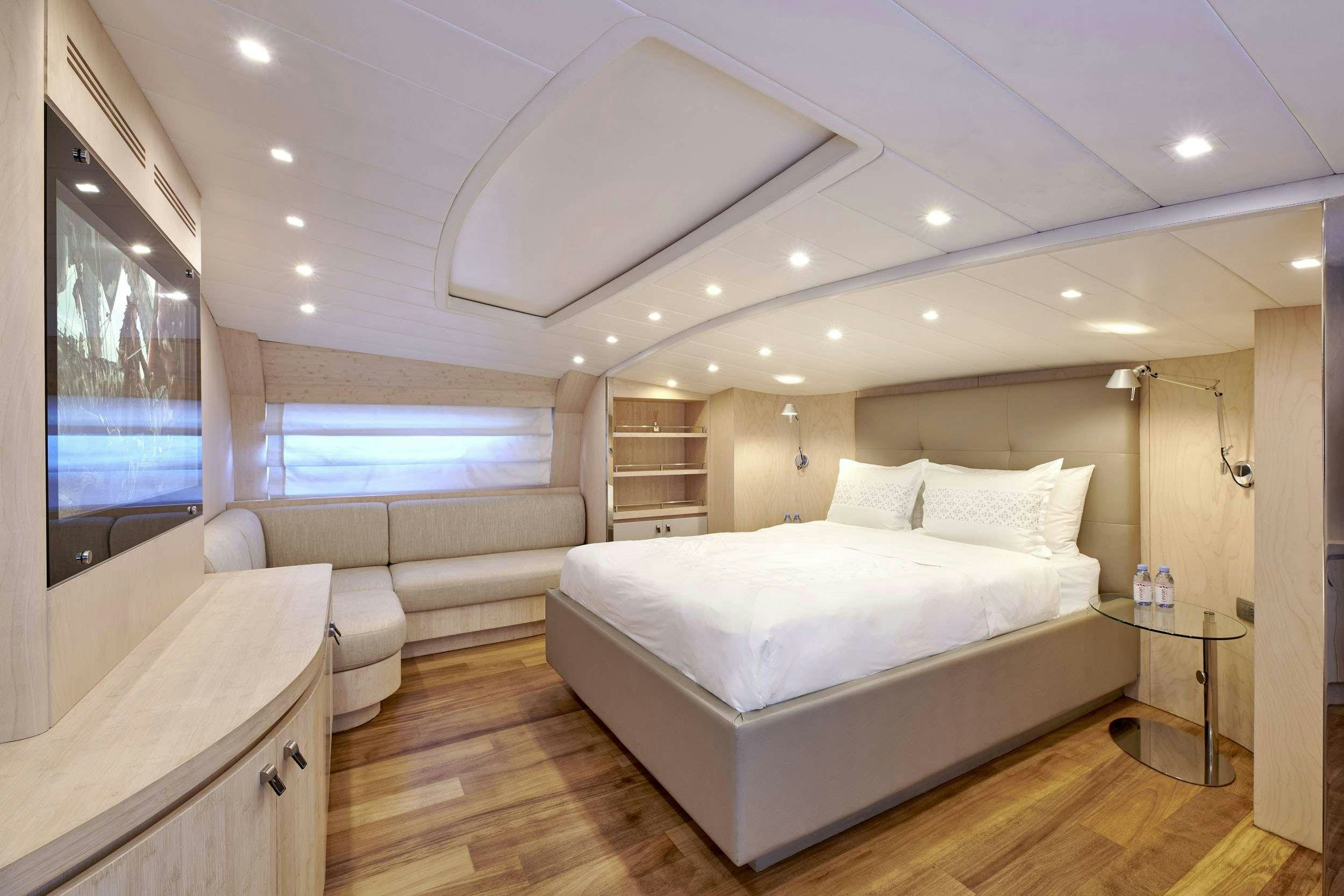 a large white bed in a room aboard WHITE KNIGHT Yacht for Charter