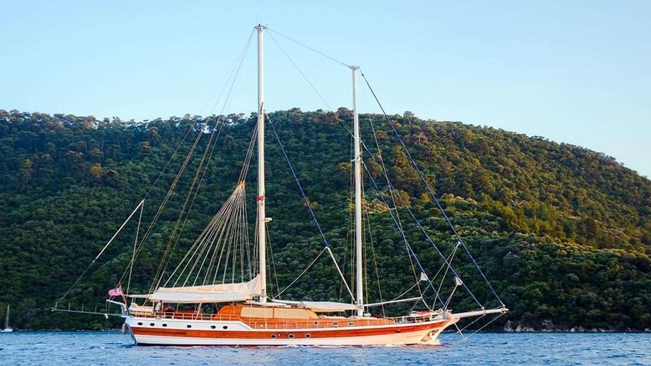 a sailboat on the water aboard WICKED FELINA Yacht for Charter