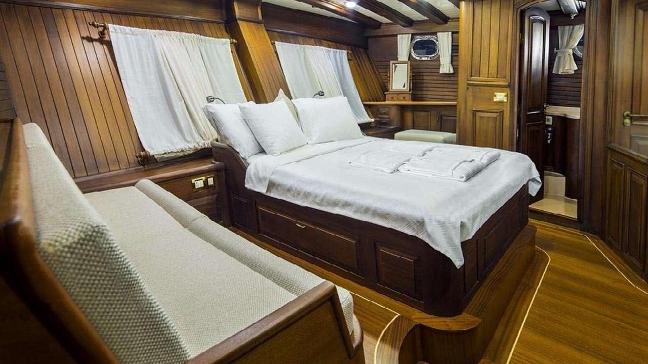 a room with two beds aboard WICKED FELINA Yacht for Charter