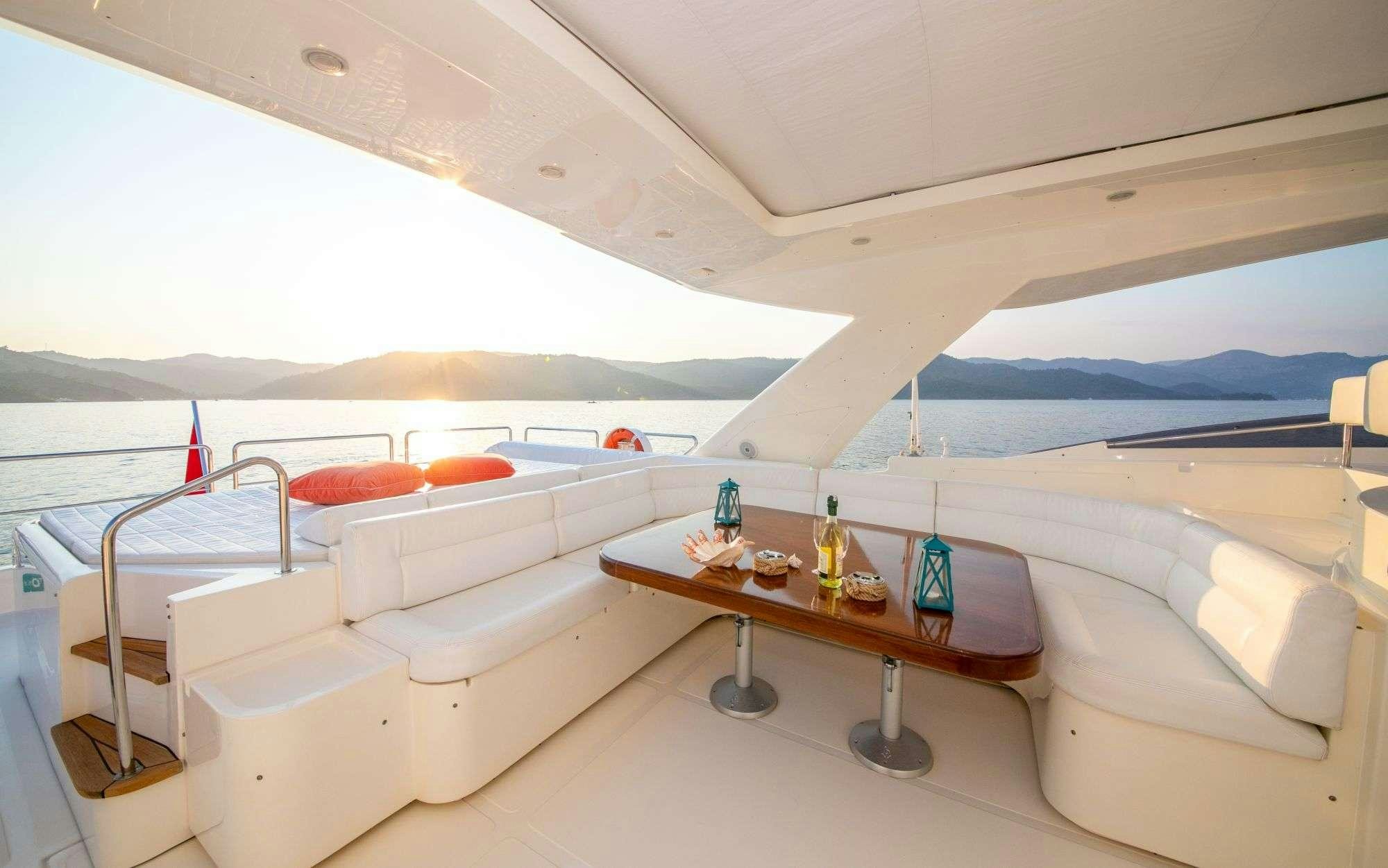 a room with a bed and a table aboard FUNDA D Yacht for Charter