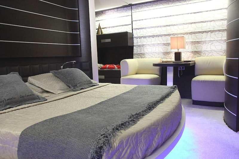 a bed in a room aboard SUPER TOY Yacht for Charter