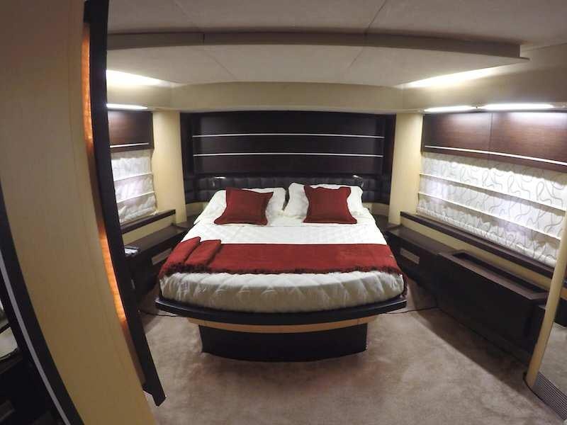 a bed in a room aboard SUPER TOY Yacht for Charter