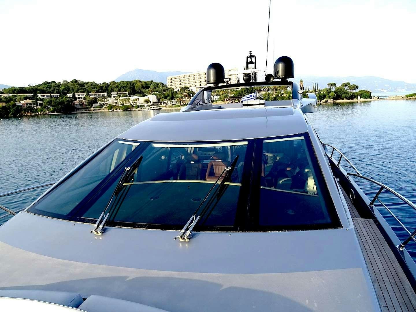a boat with a large machine on the front aboard SUPER TOY Yacht for Charter
