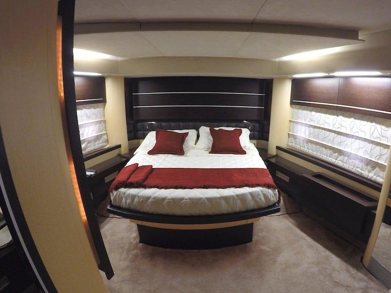 a bed in a room aboard SUPER TOY Yacht for Charter