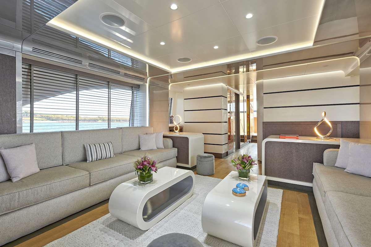 a living room with a large window aboard LA FENICE Yacht for Charter