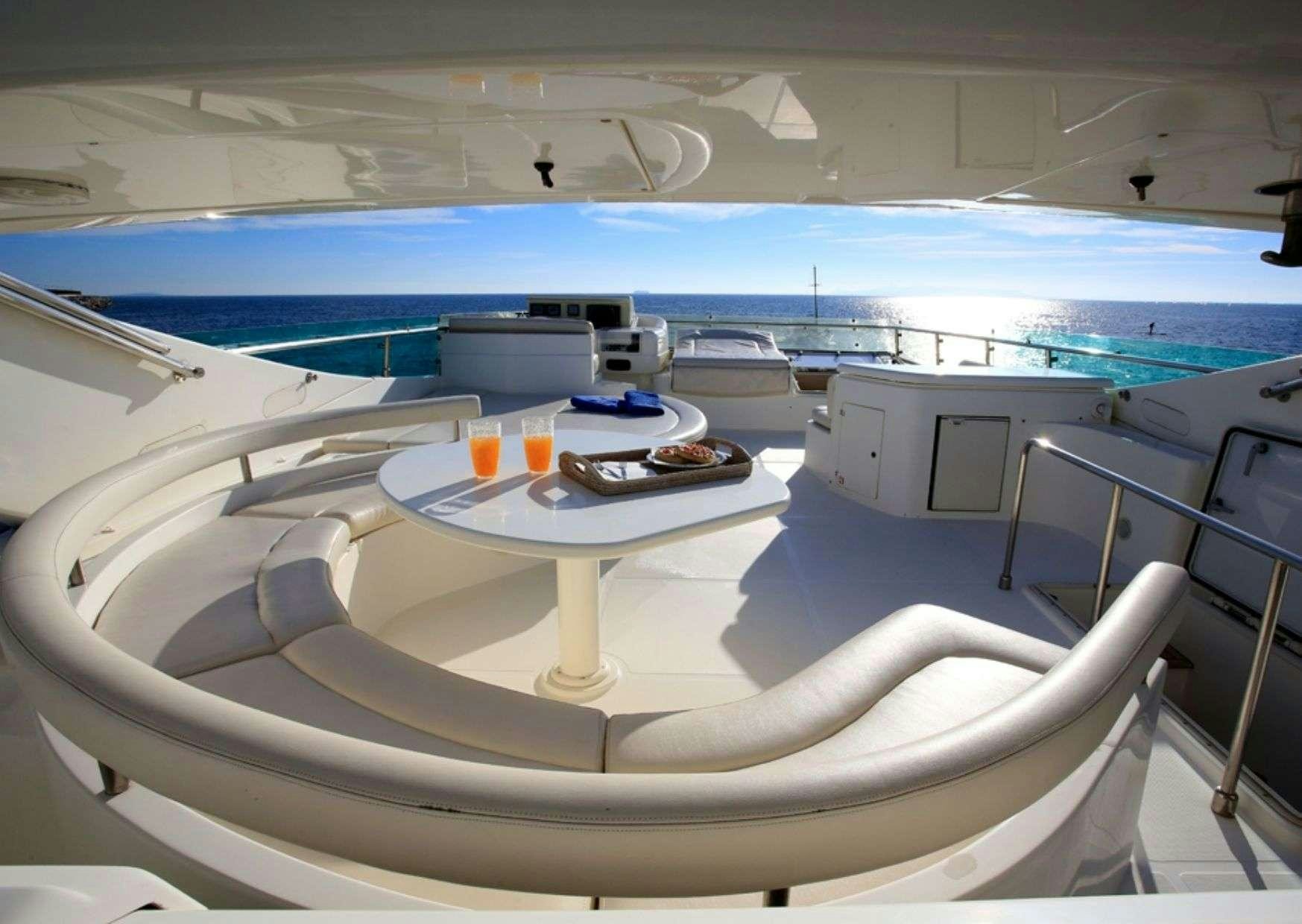 a white lounge chair on a boat aboard ADE YIA Yacht for Charter