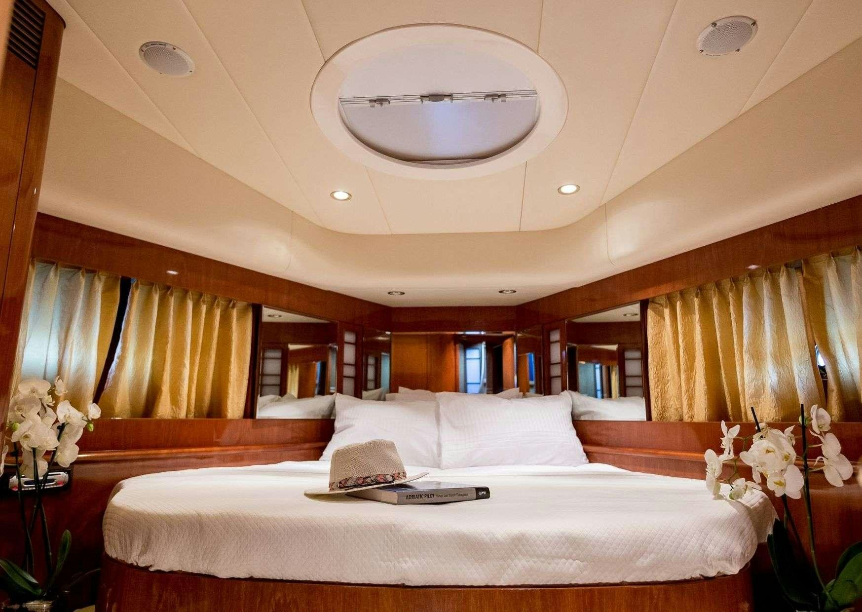a large bed in a room aboard MARLIN Yacht for Charter