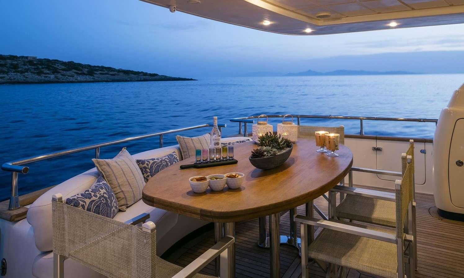 a table on a boat aboard GORGEOUS Yacht for Charter