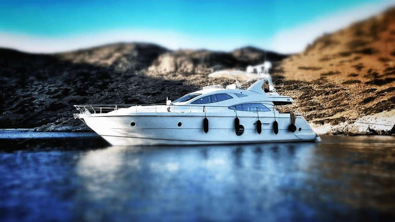 a white yacht in the water aboard REVIVAL Yacht for Charter