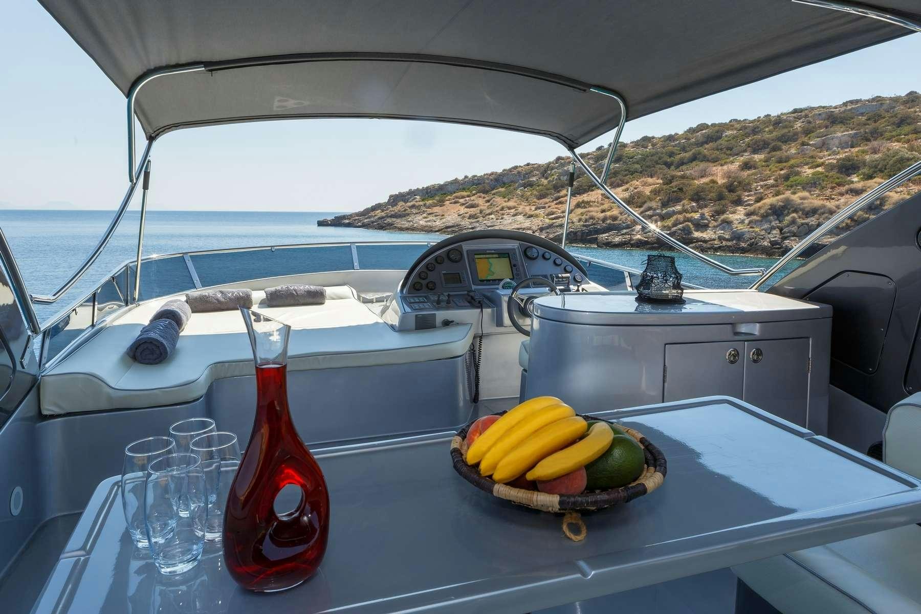 a boat with fruit on it aboard REVIVAL Yacht for Charter