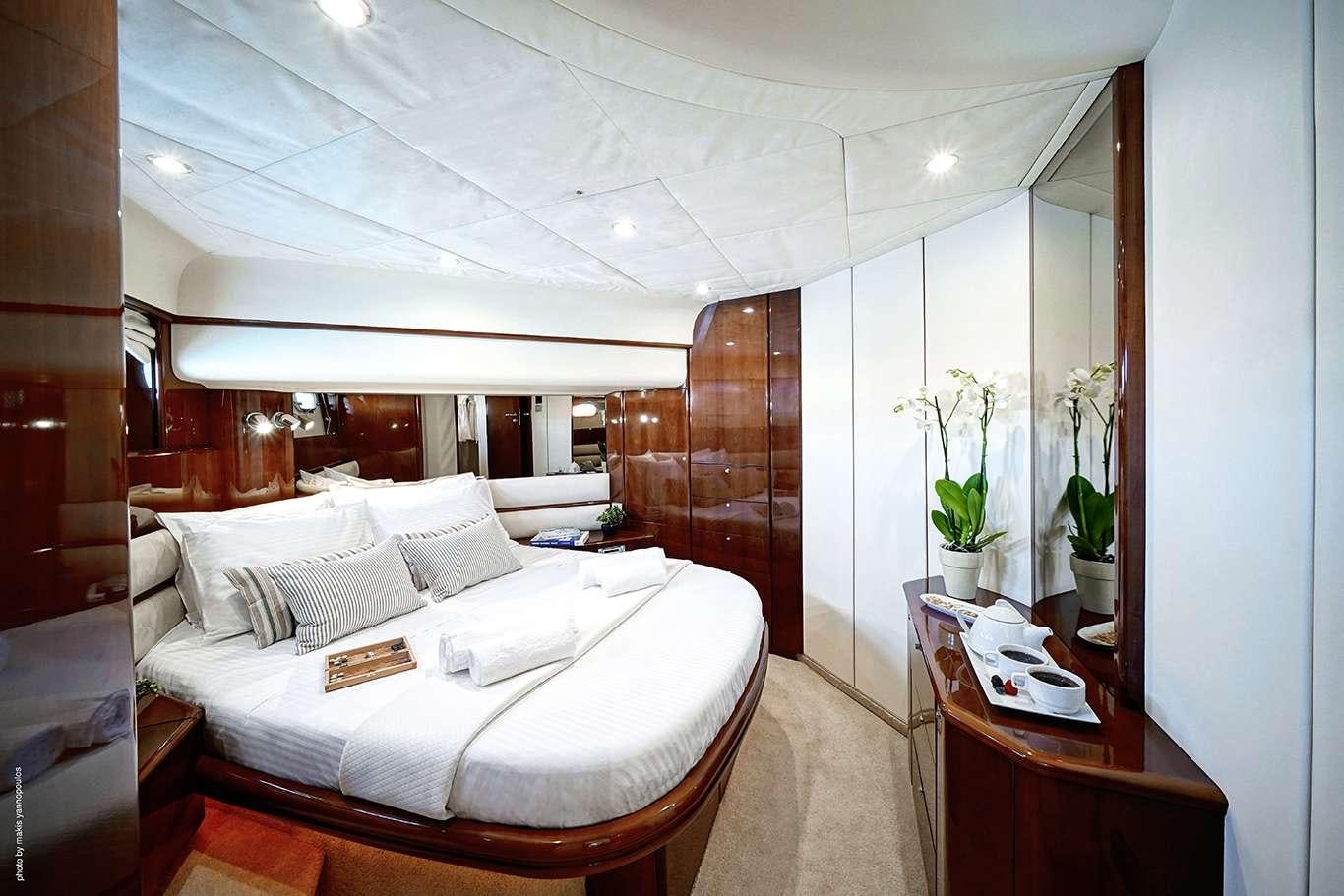 a bed in a room aboard DISTAR PRINCESS Yacht for Charter