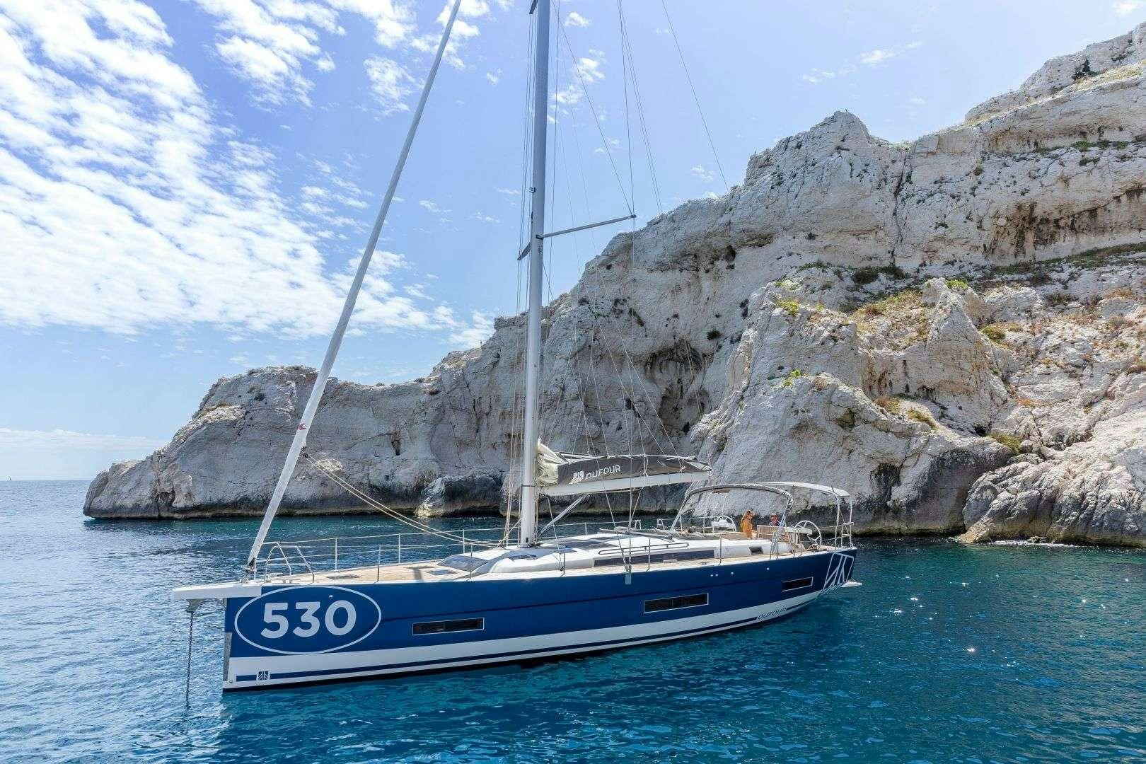 a boat on the water aboard DIMPA Yacht for Charter