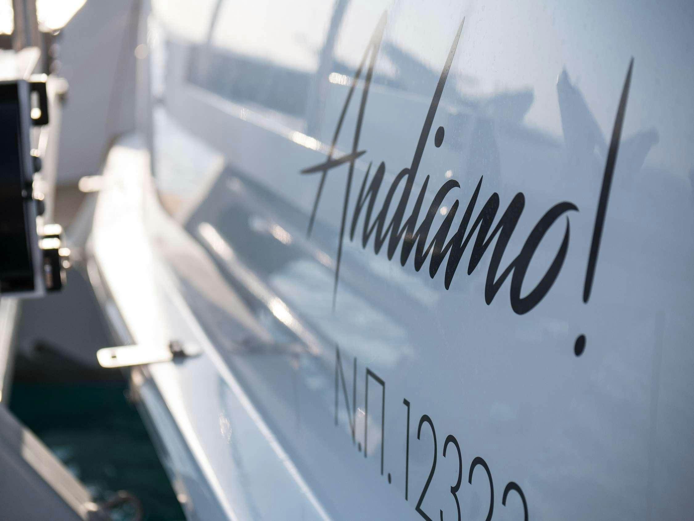 a sign on a building aboard ANDIAMO Yacht for Charter