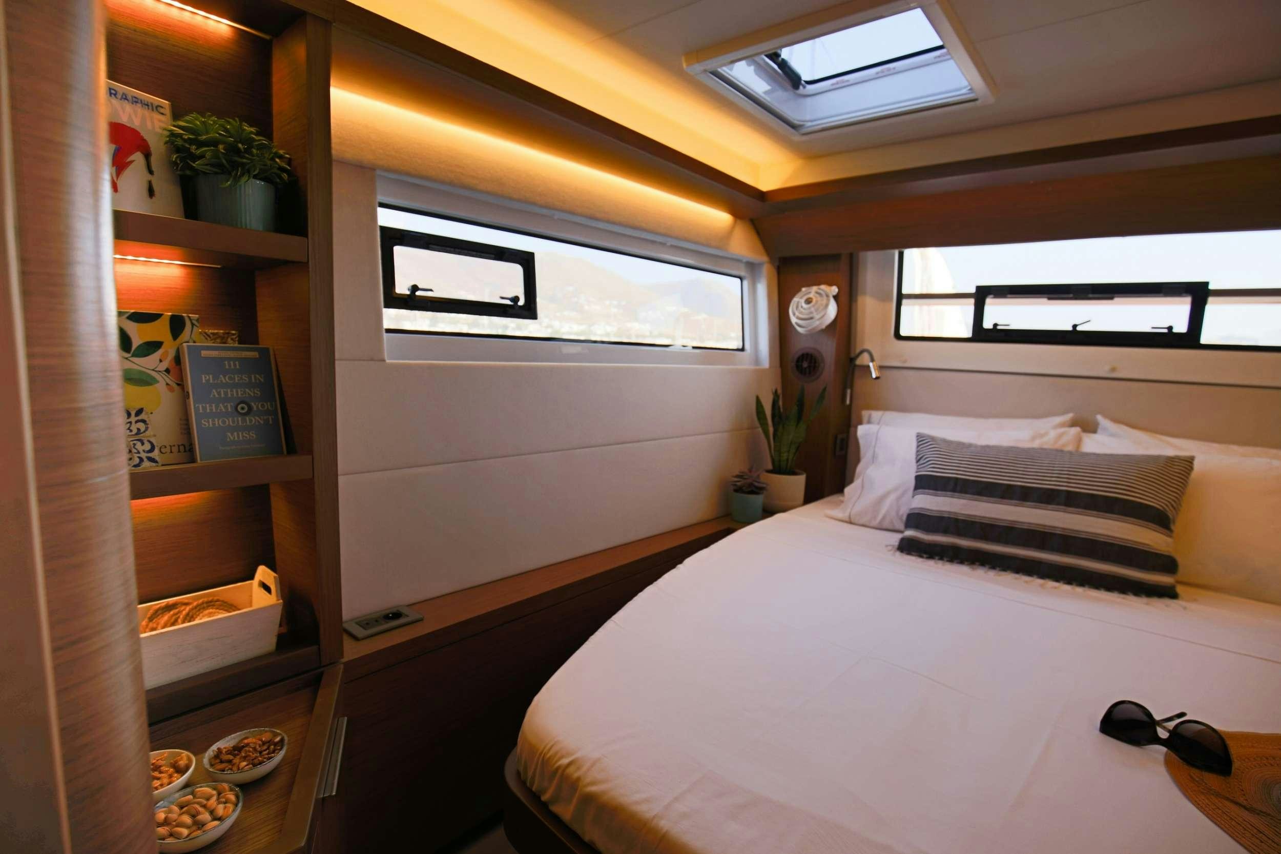 a bed in a room aboard ANDIAMO Yacht for Charter