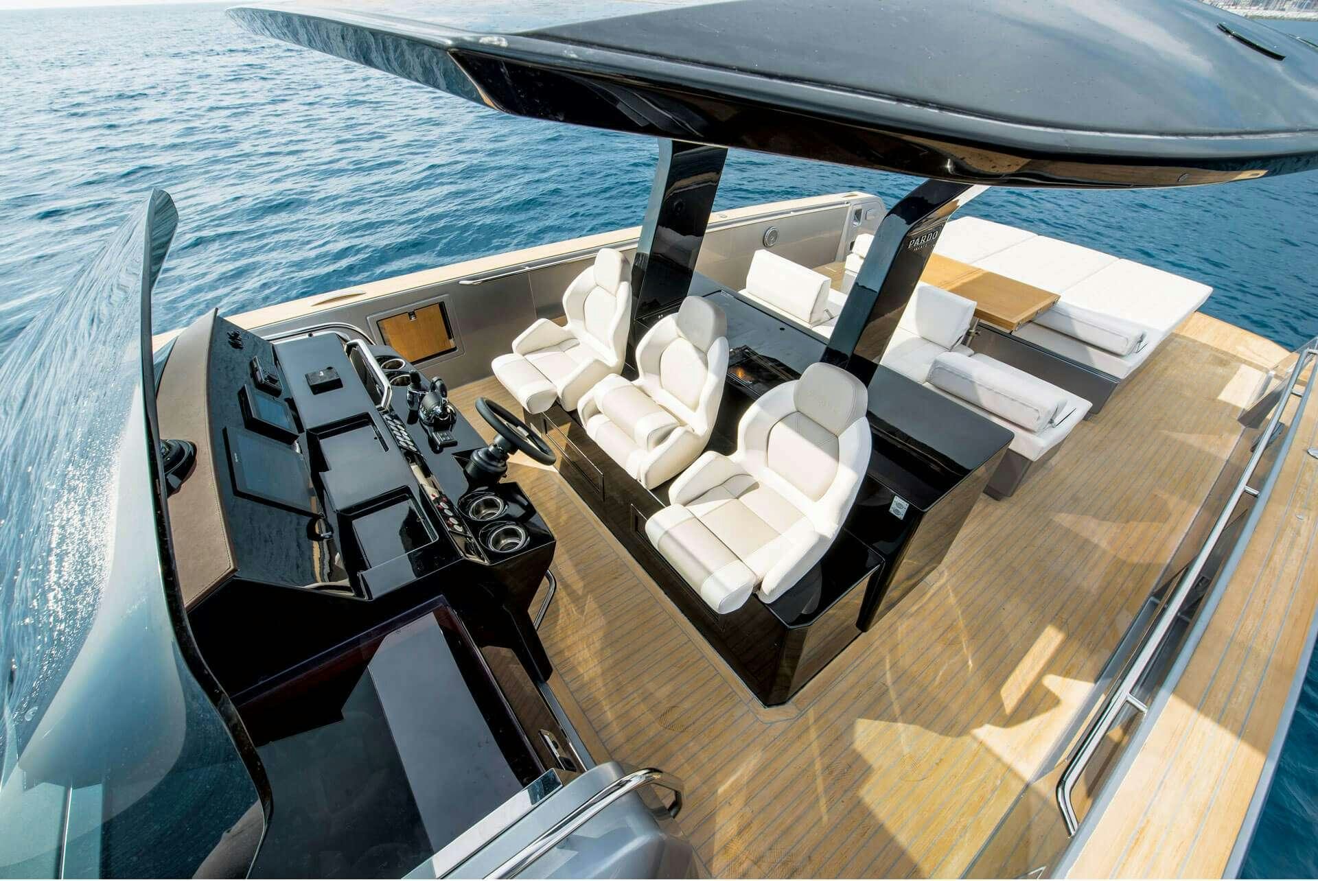 a boat with a large deck aboard BABY D Yacht for Charter