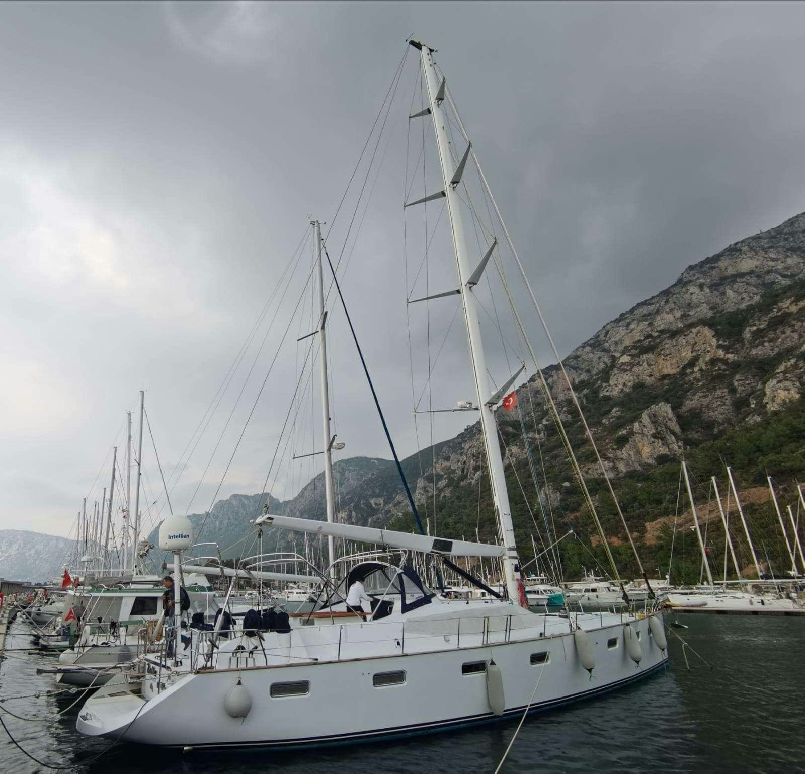 a boat docked at a pier aboard BELLA Yacht for Charter