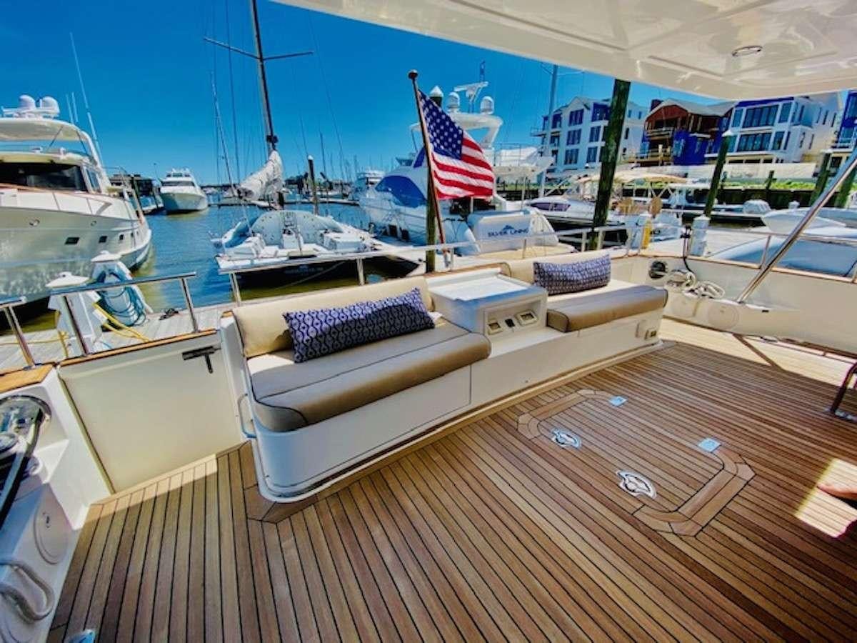 a boat dock with boats aboard ELLEON Yacht for Charter