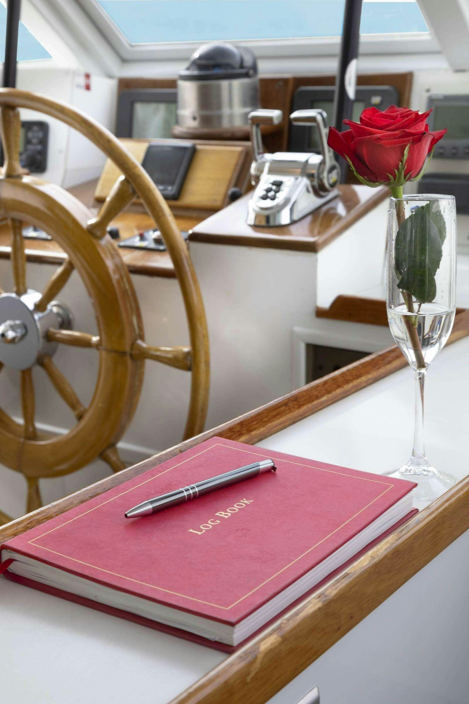a flower on a table aboard SEA BOUND Yacht for Charter
