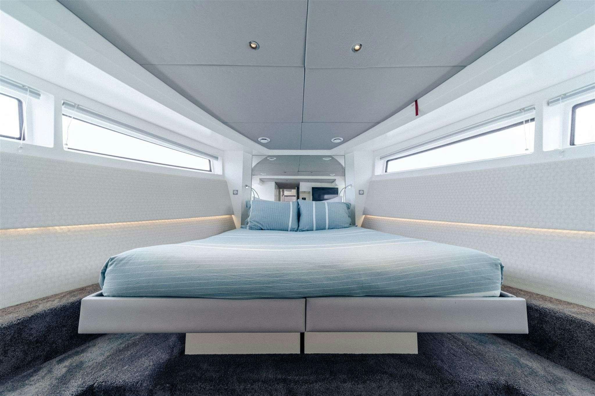 a bed in a room aboard GO N HOT Yacht for Charter