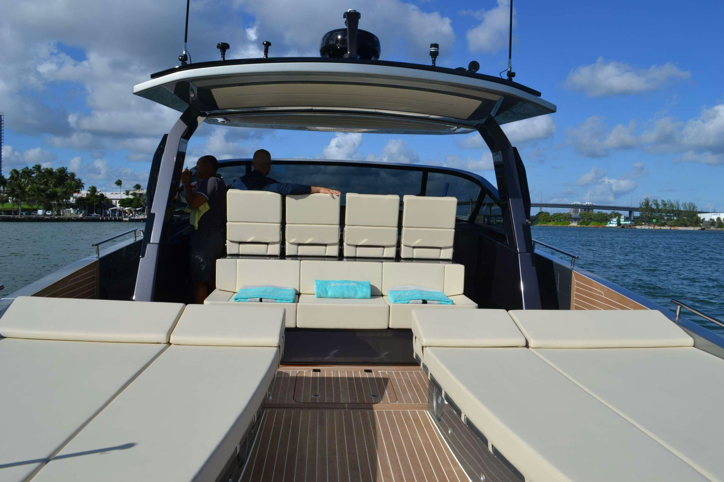 a boat with a group of people on it aboard JANINA Yacht for Charter