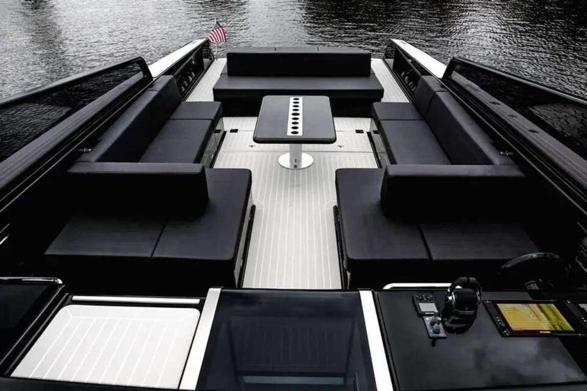 a group of black rectangular objects on a wooden surface aboard BIG BANG Yacht for Charter