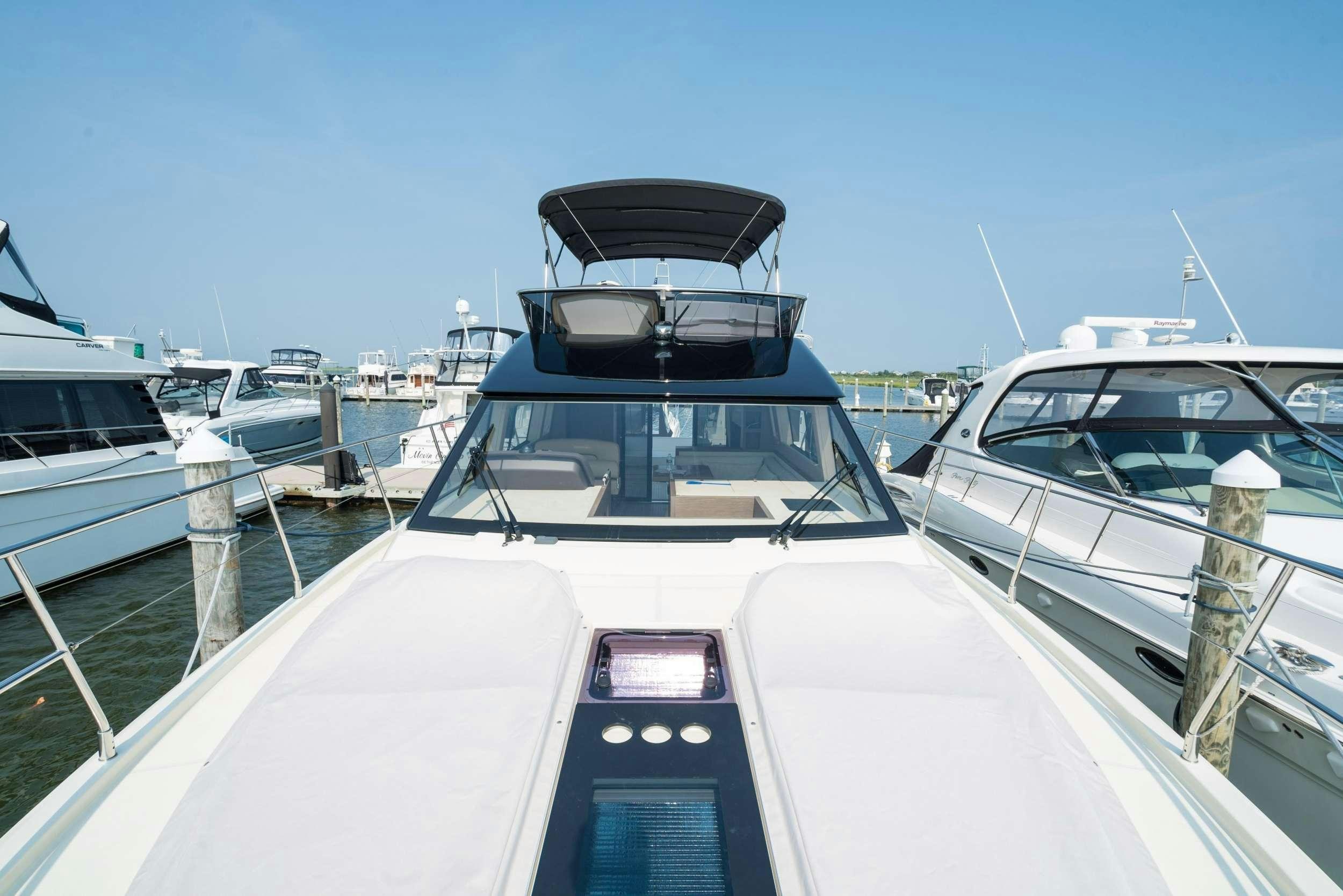 a group of boats in a harbor aboard PILOTS LOUNGE Yacht for Charter