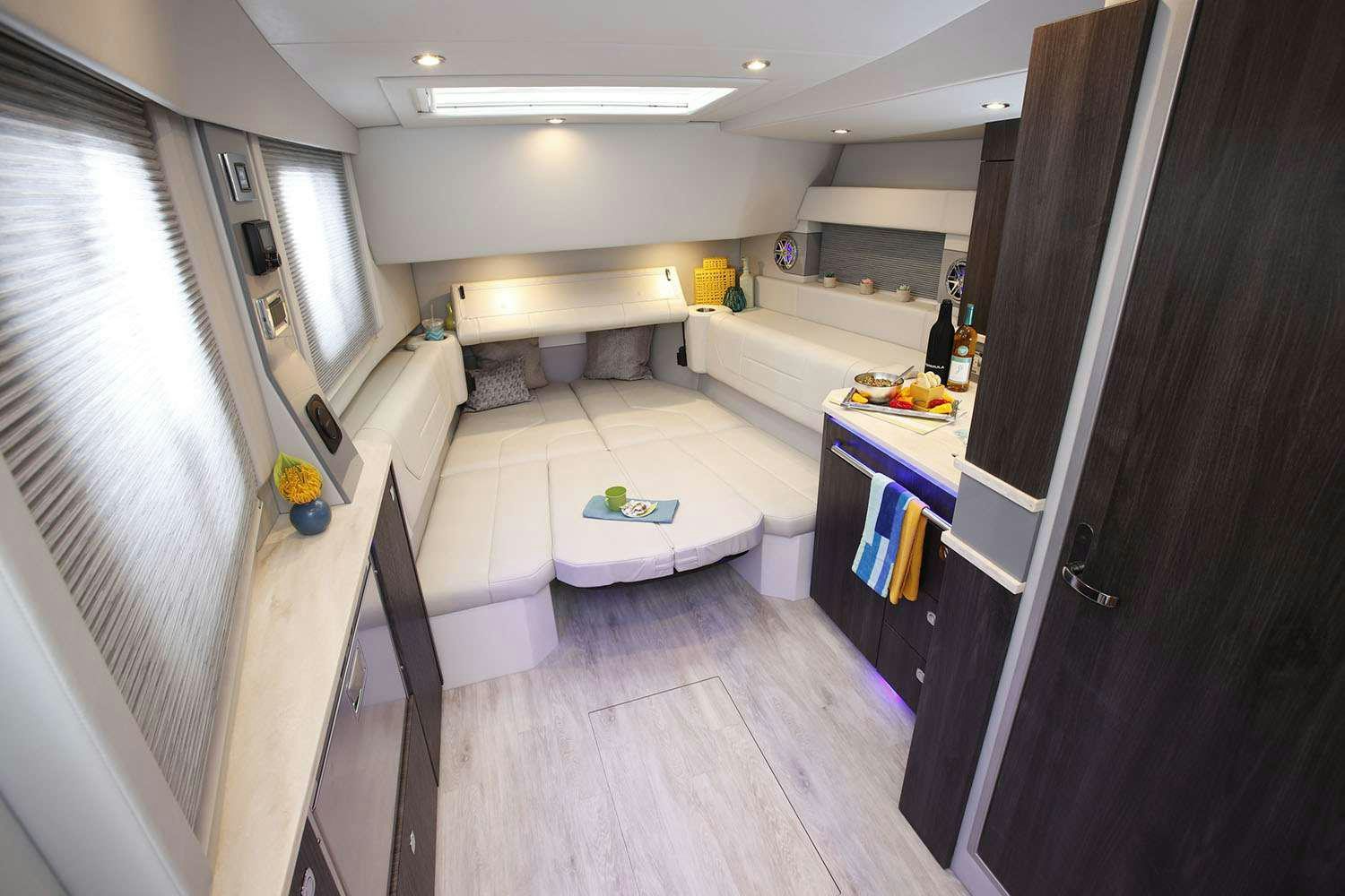 a kitchen with a bed and a sink aboard Life Is Good Yacht for Charter