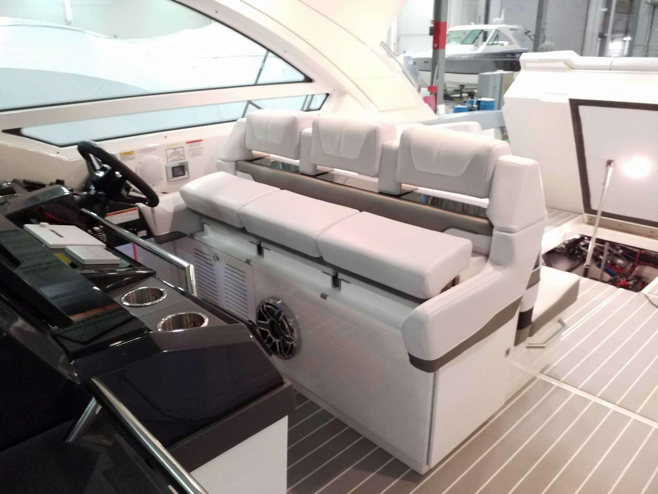 a white couch in a room aboard Life Is Good Yacht for Charter