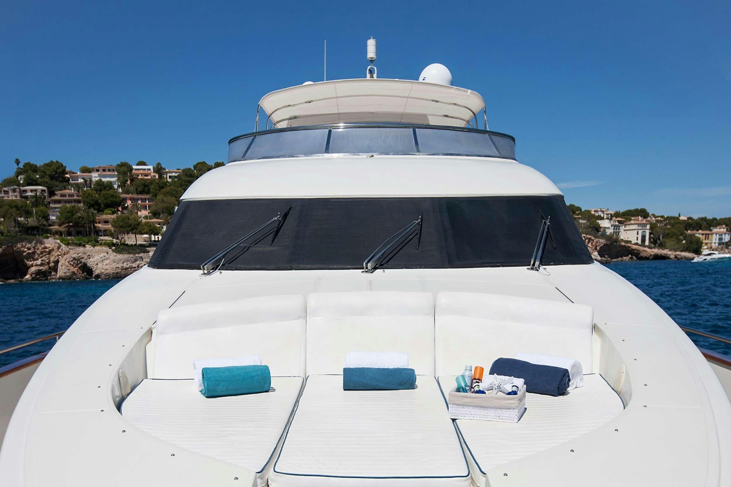 a white yacht on the water aboard WHITE FANG Yacht for Charter