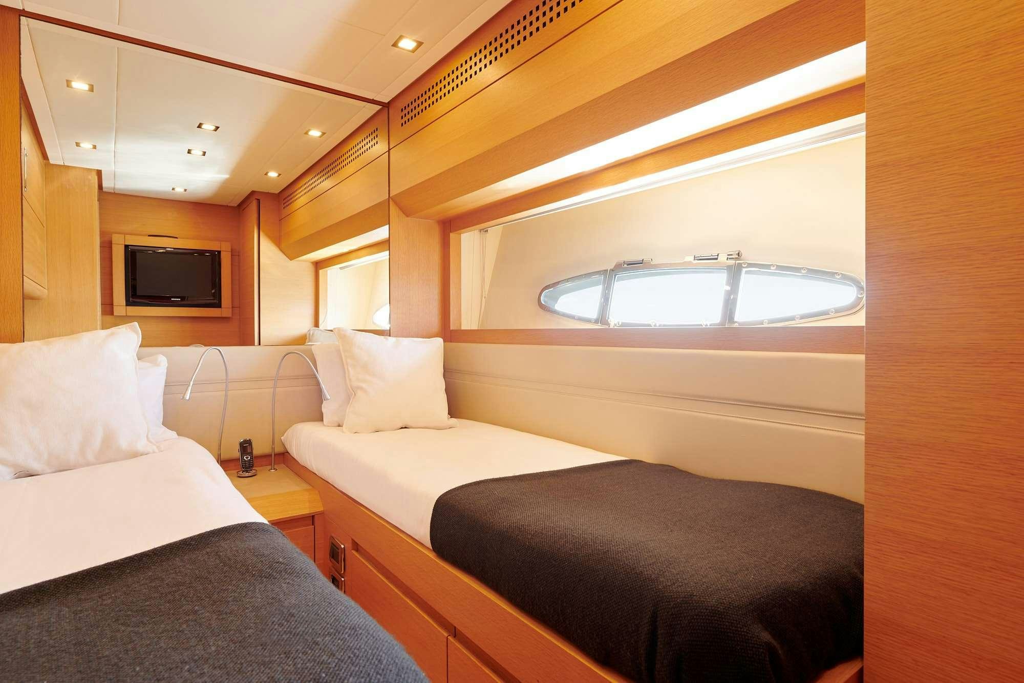 a room with two beds aboard HALLEY Yacht for Charter