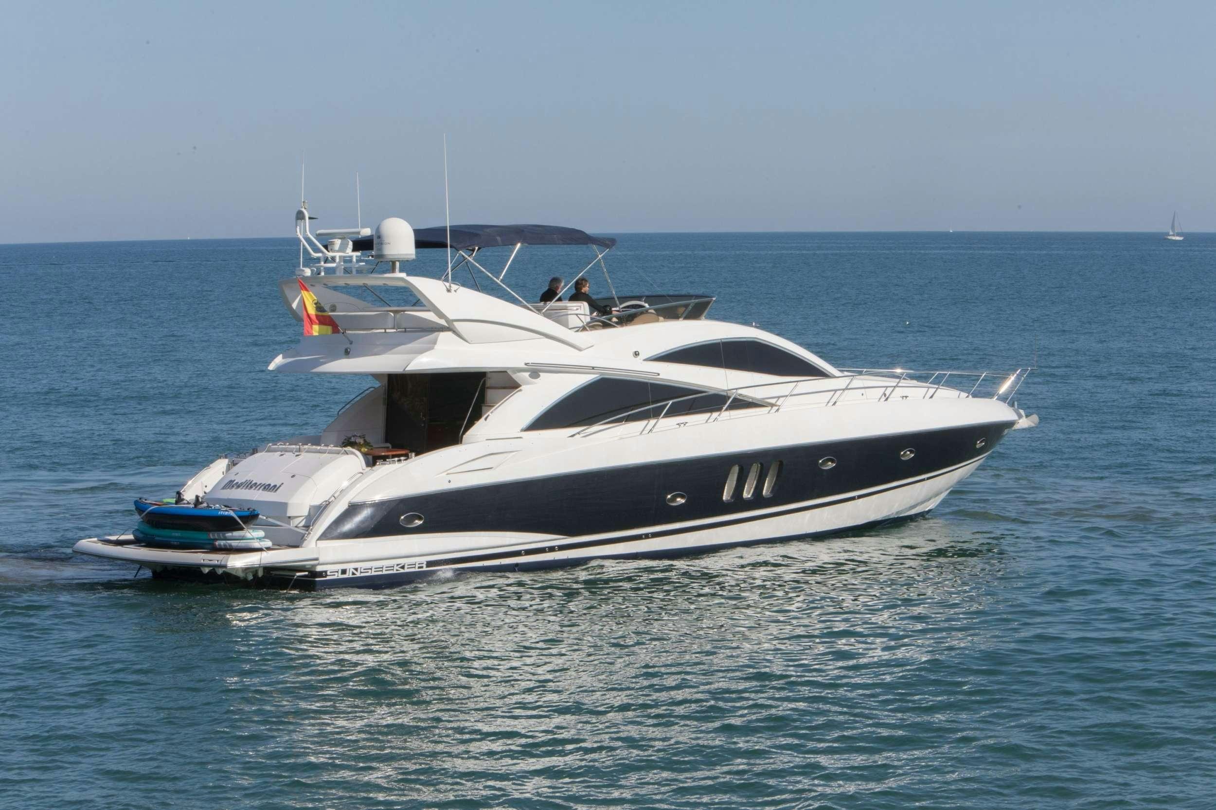 a white yacht in the water aboard MEDITERRANI IV Yacht for Charter